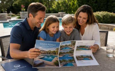 A family of four joyfully examines a vibrant brochure featuring various pool designs at a sunlit outdoor patio, surrounded by lush greenery